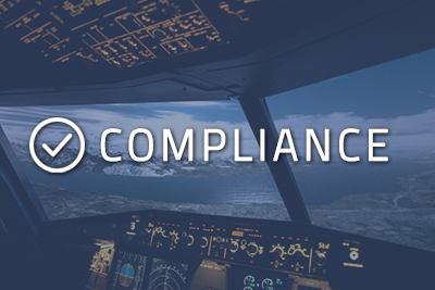 Photo of a cockpit with "Compliance" written over it